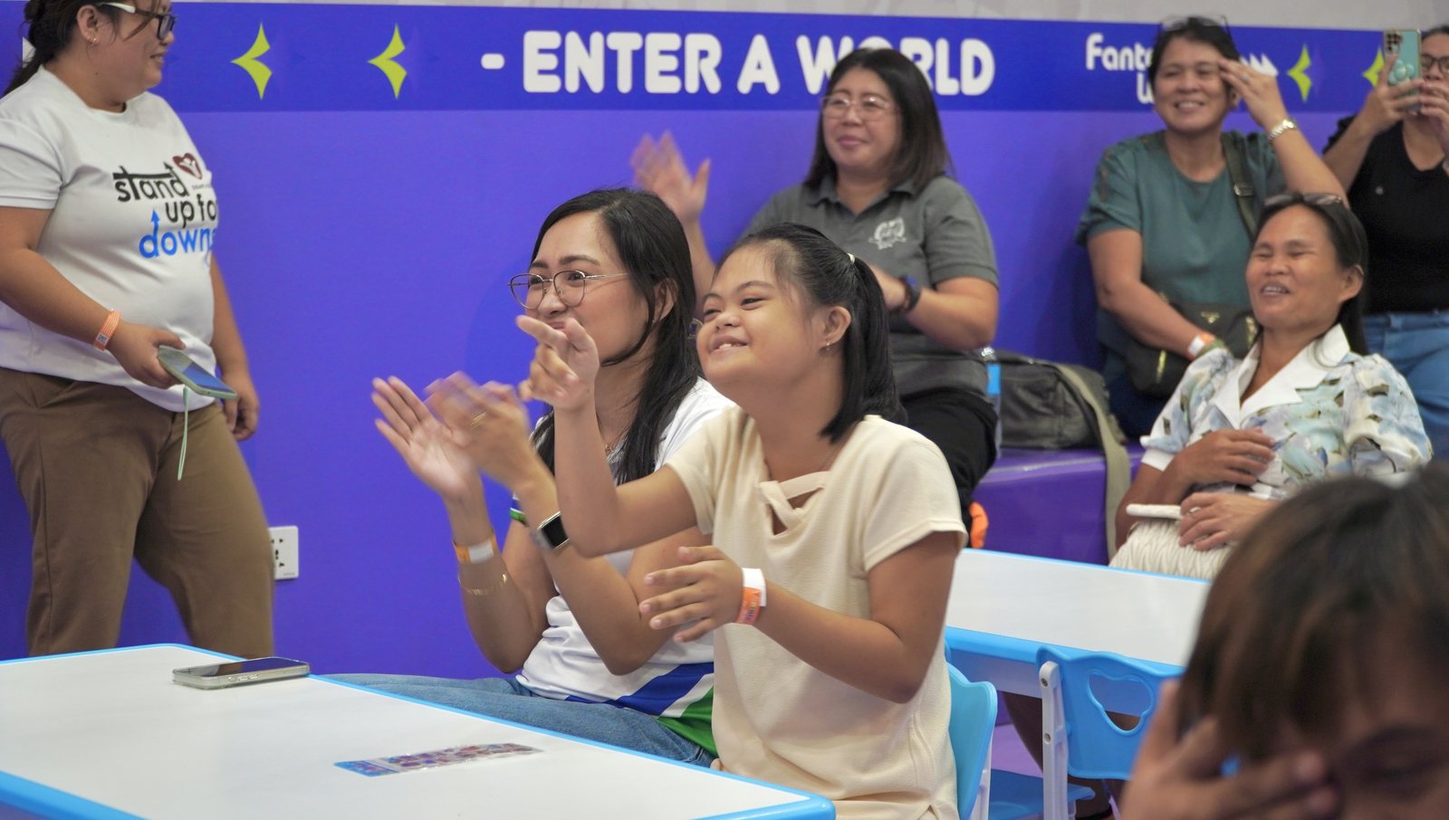 Applause from one of the tables.