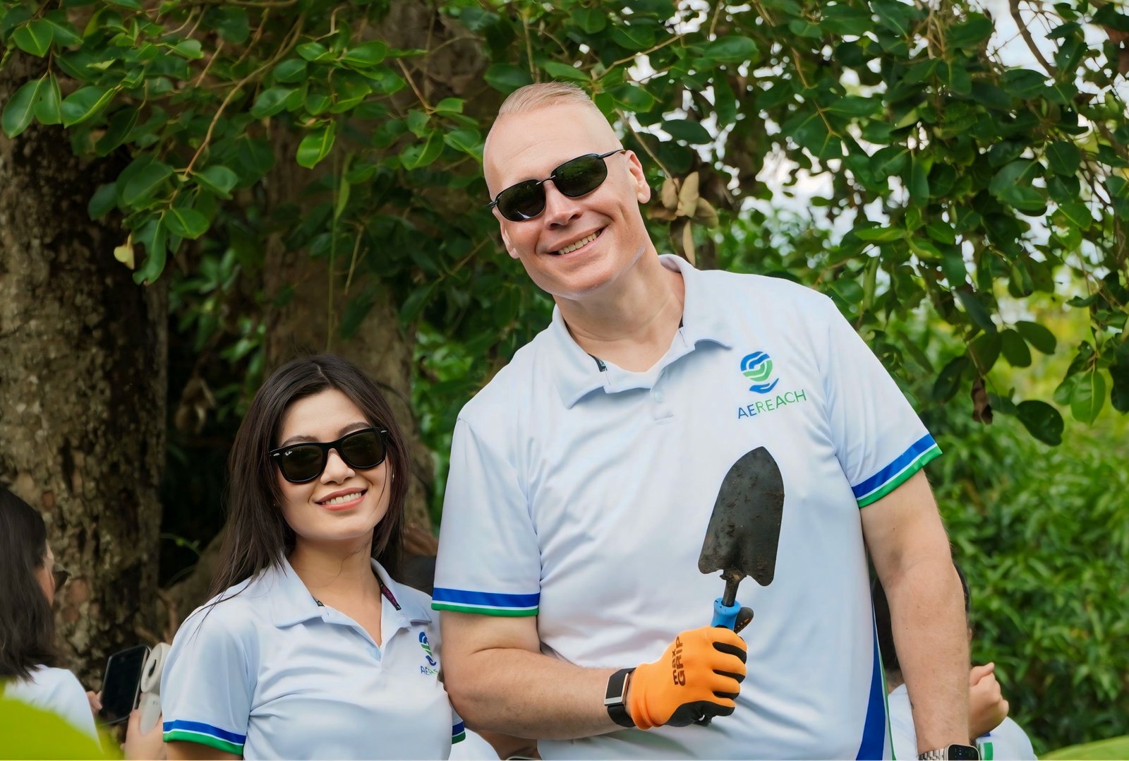 Tim Bonnell and a teammate with a spade at the site.